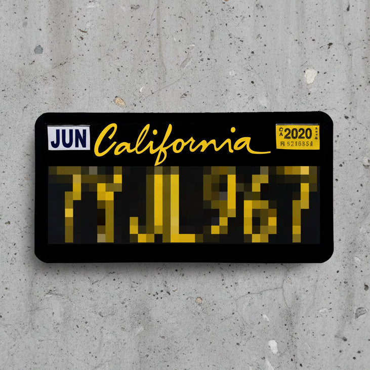 A novelty California license plate with a black background, yellow pixelated numbers, 'JUN California' in yellow script, a white 'JUN' box on the left, and a yellow '2020' sticker on the right, shown on a plain white background.