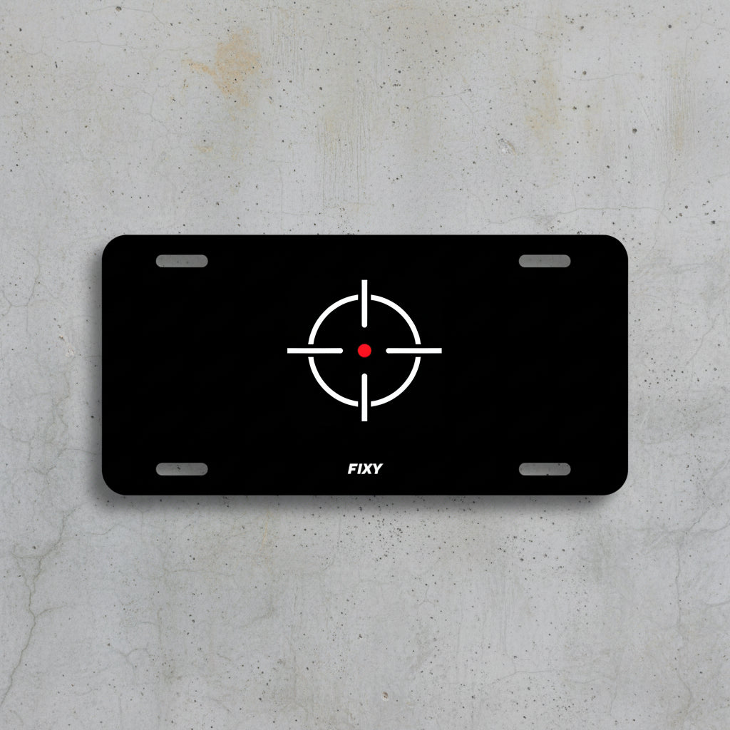 Black license plate with white crosshair design and 'FIXY' branding on a white background