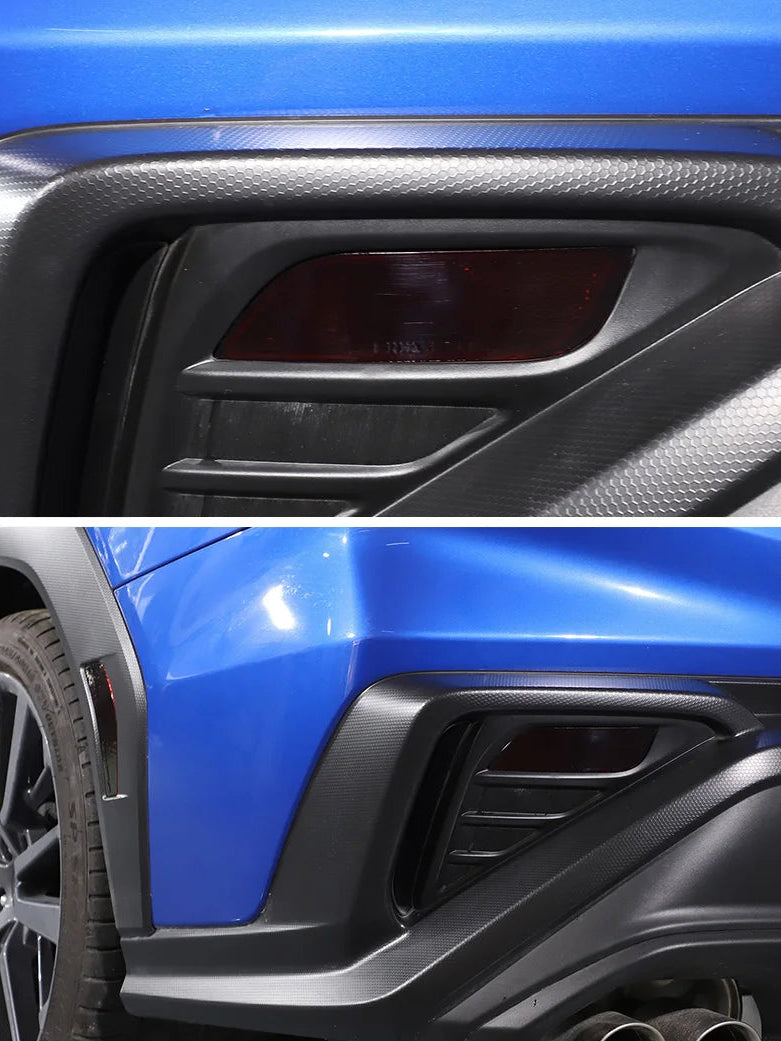 Close-up of a car's air intake system with a blue car background