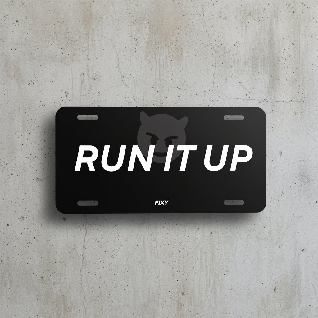 Black license plate with 'RUN IT UP' text and a logo on a white background