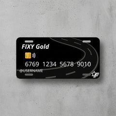 Black license plate with road design and FIXY Gold branding