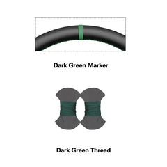 Dark green thread and marker on a white background