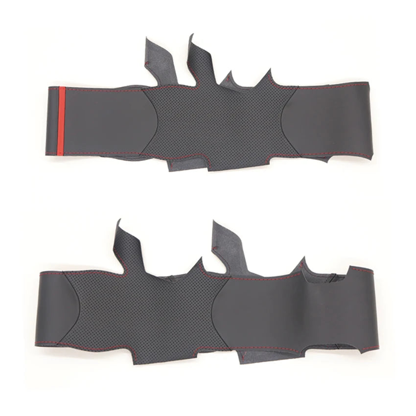 Two black protective arm guards with red accents on a white background