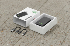 CarPlay and Android Auto device with cables and packaging on a white background