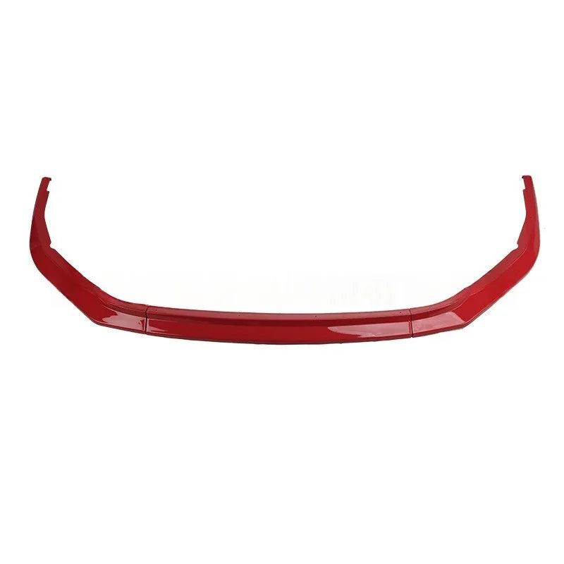 A glossy red automotive front bumper lip or splitter trim piece, shown against a plain white background.