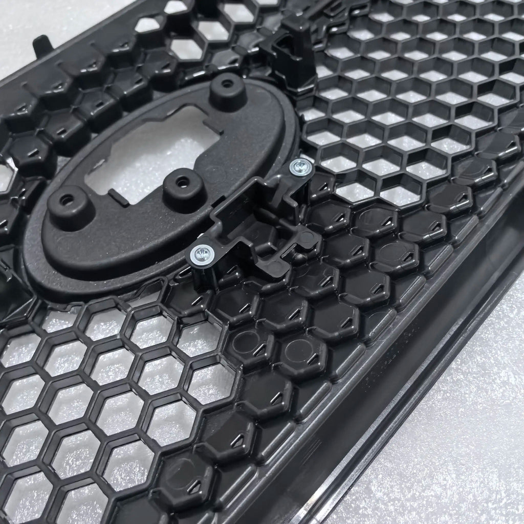 Close-up of a black and gray honeycomb-patterned product