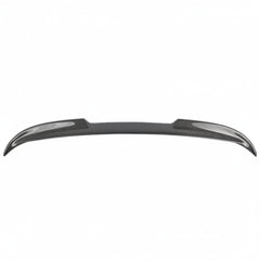 Carbon fiber car spoiler on a blue Subaru WRX with a white background