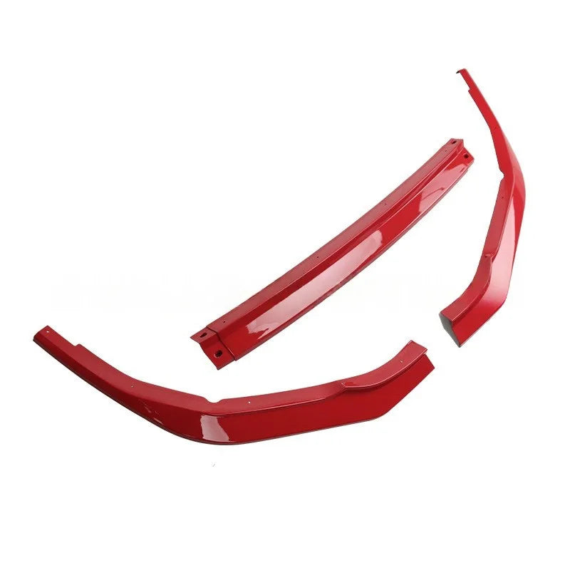 A set of three glossy red automotive body trim pieces, including a long center console trim piece and two curved console end pieces, displayed on a clean white background.
