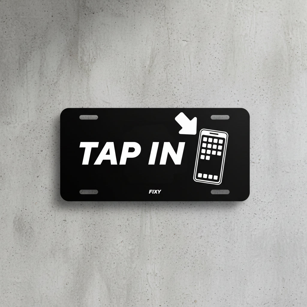 license plate with 'TAP IN' text and phone icon on a gray background