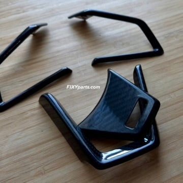 Black metal brackets on a wooden surface with 'FIXYParts.com' branding.